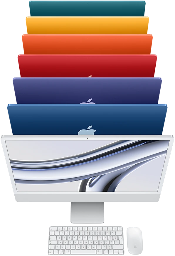 Top view of 7 iMac's with colors silver, blue, purple, pink, orange, yellow and green.