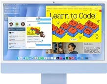 iMac, front exterior, blue color, displaying Messages app and a 'Learn to Code' website