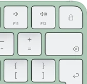 Magic Keyboard, top-right corner, green color, Touch ID , delete key, and volume function keys