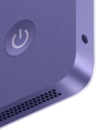 iMac, rear exterior, purple color, features: power button, headphone jack, and speaker grille