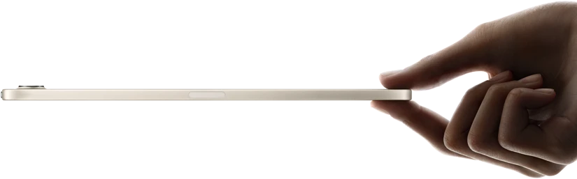 iPad mini, held in hand, side view, thin and lightweight design