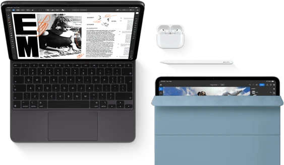iPad Pro attached to Magic Keyboard, front exterior, space black color, rounded corners, black display bezel, open, display showing article editing app with text and photograph of a woman playing music, Airpods 4 in open case, blue Smart Folio cover on iPad Pro with Apple Pencil Pro resting atop device, cover slightly open revealing display