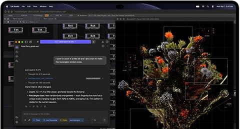 MacBook Pro with PROLED XDR Display, space black color, screen shows an image being created using TouchDesigner and LM Studio